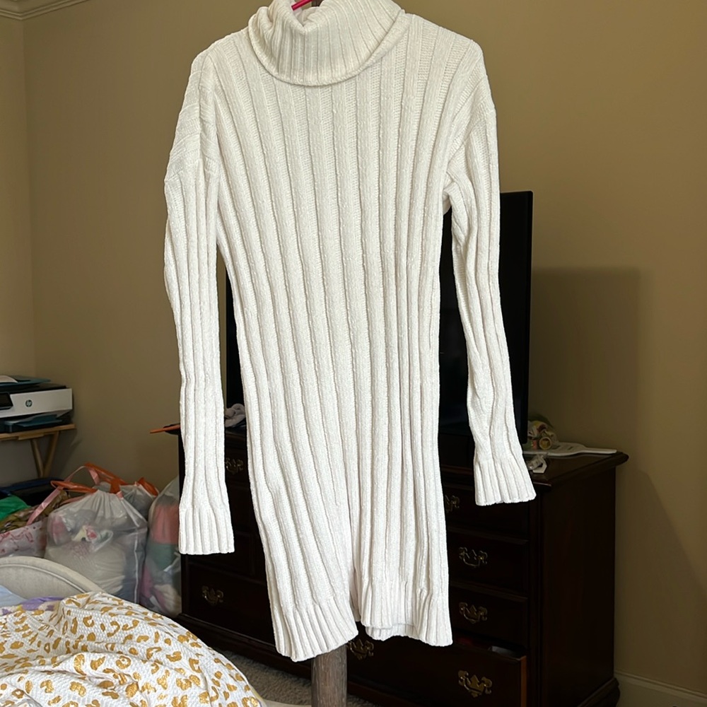 Women’s cream colored sweater dress.
